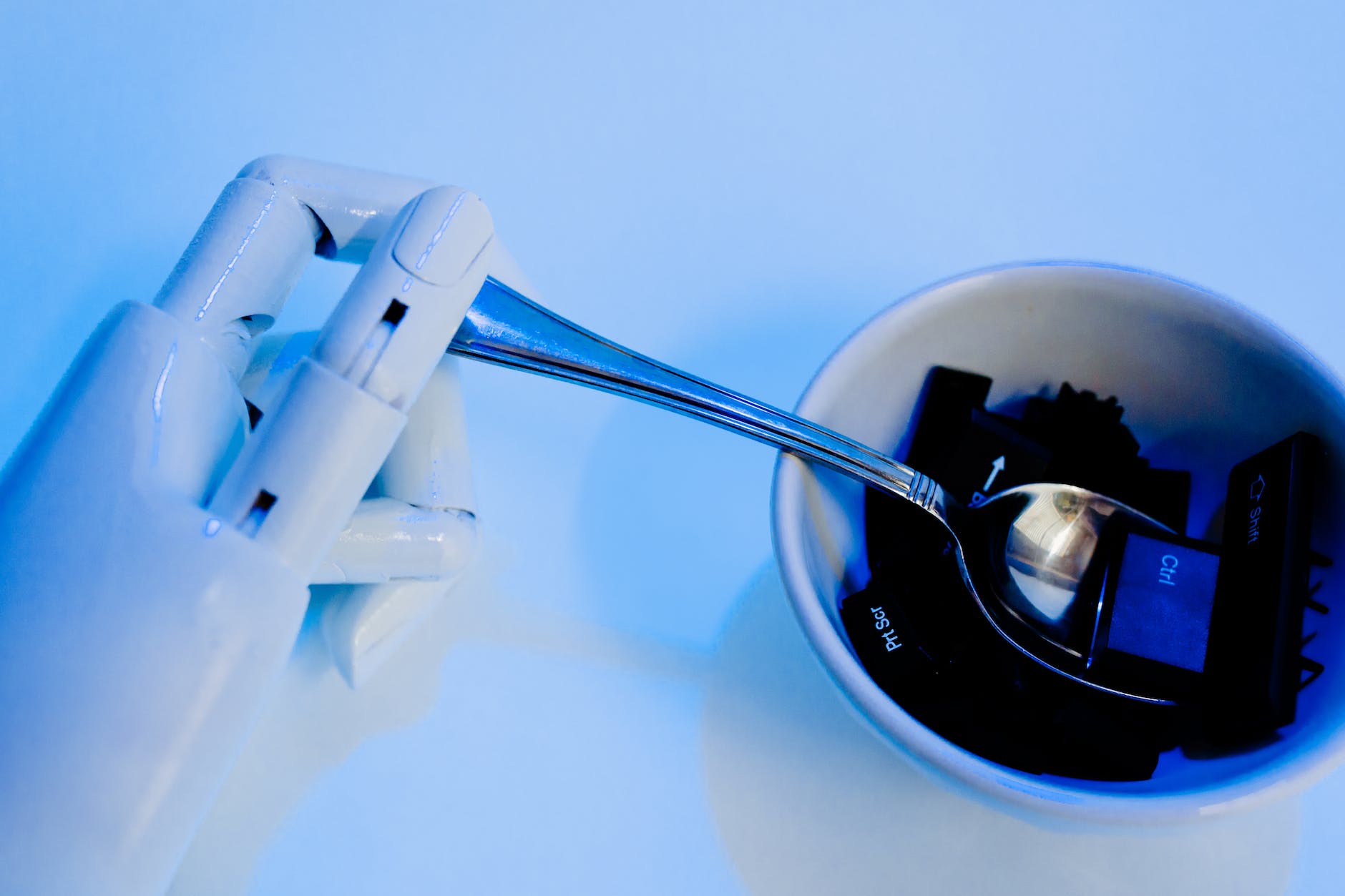 robot holding a spoon